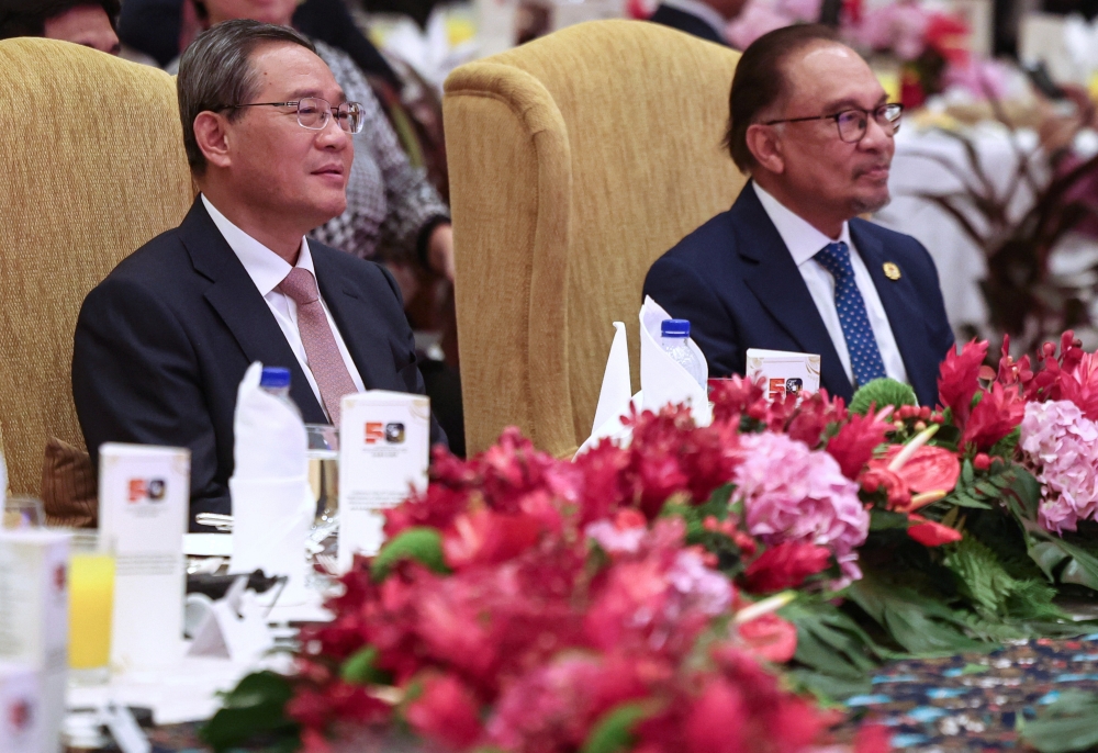 Prime Minister Datuk Seri Anwar Ibrahim with Chinese Premier Li Qiang attend a dinner in Celebration of the 50th Anniversary of the Establishment Diplomatic Relations Between Malaysia and China, June 19, 2024. In a statement, both leaders today gave their commitment to promote an equal and orderly multipolar world and a universally beneficial and inclusive economic globalisation. — Bernama pic 