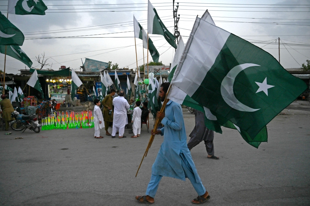 A Pakistani man accused of desecrating the Quran was slain and burned Thursday by a crowd that removed him from a police station where he had been detained for his protection, authorities said. — AFP pic