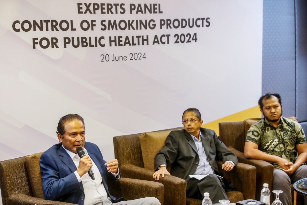 Dr Arifin Fii (left), president of Advanced Centre for Addiction Treatment Advocacy (ACATA), at the Control of Smoking Products for Public Health Act 2024 (Act 852) Roundtable — Picture by Hari Anggara