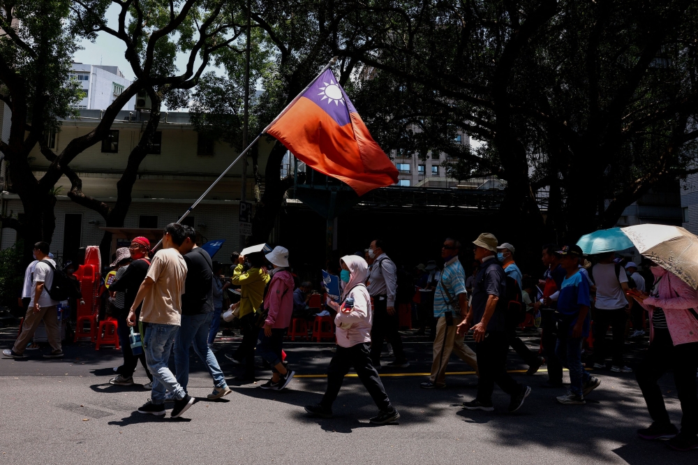 Taiwan government said on Friday it ‘deeply regrets’ China’s move to impose the death penalty in extreme cases for what it called ‘diehard’ Taiwan independence separatists. — Reuters pic