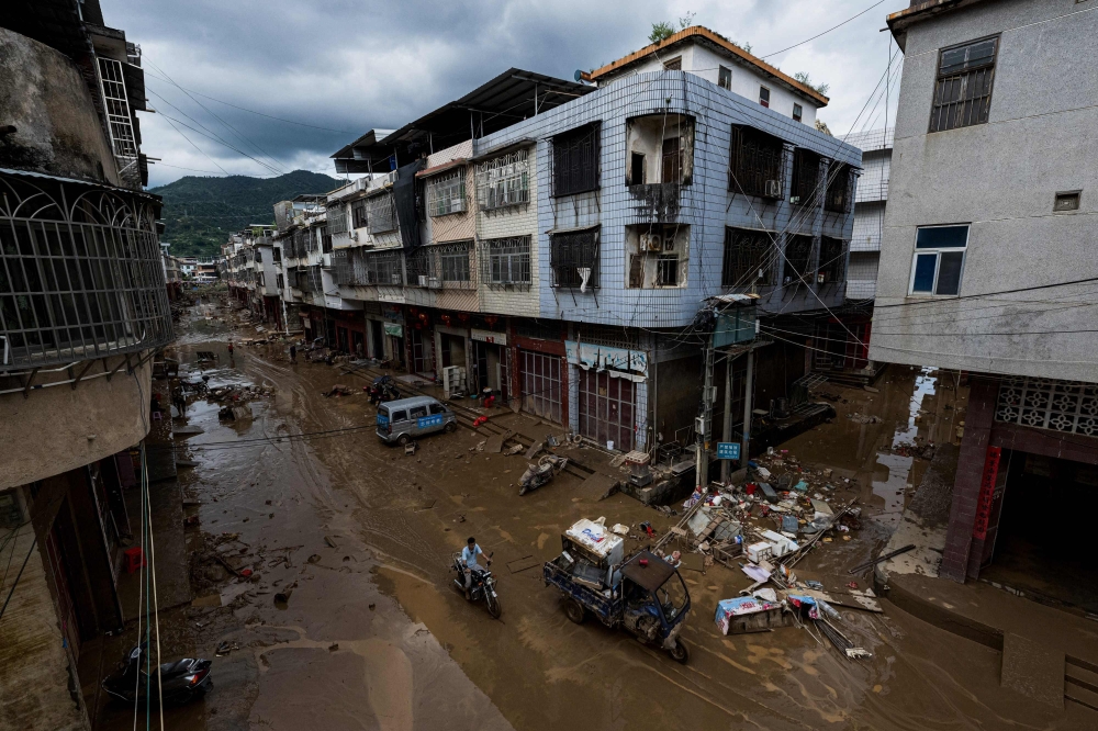 The death toll from heavy rains and flooding in southern China’s Guangdong province this week rose sharply to 38 on Friday, state media reported. — AFP pic