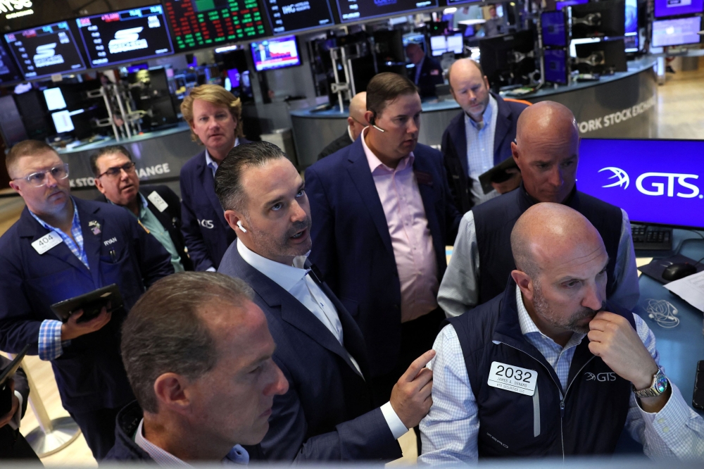 On Wall Street, the S&P 500 and Nasdaq finished slightly lower as Nvidia shares fell more than 3 per cent as the biggest drag on both indexes and sending the tech sector lower. — Reuters pic