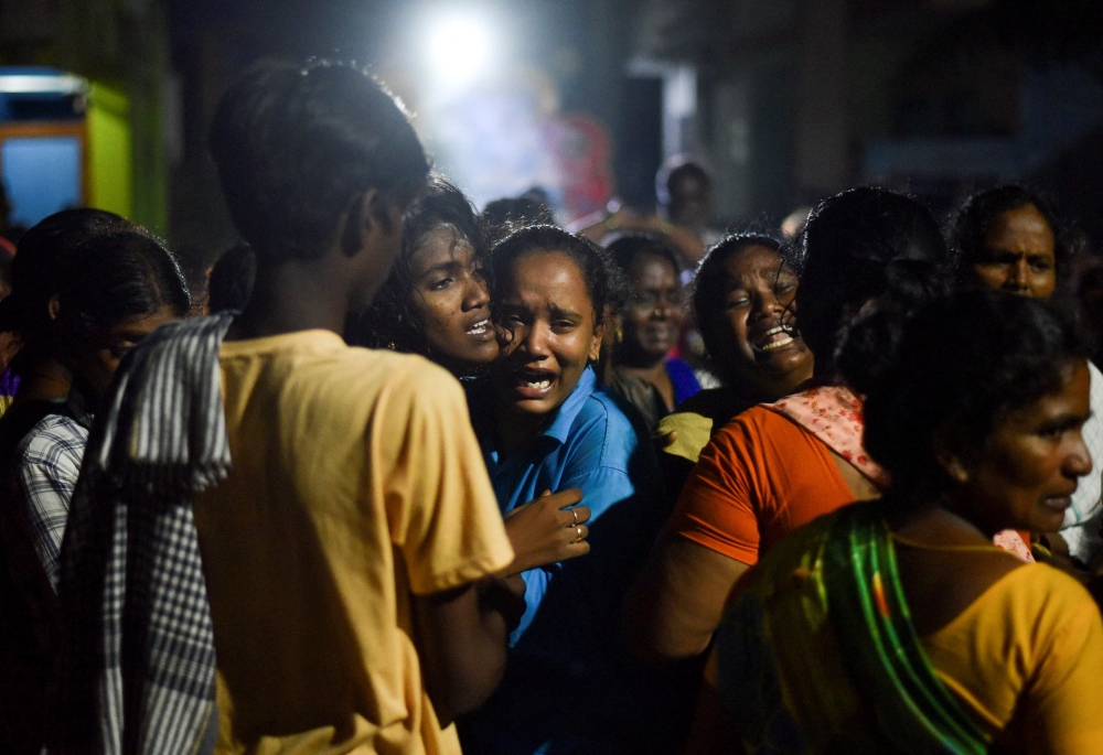 File photo of family members mourning the death of people who died after consuming toxic liquor at Kallakurichi, in Tamil Nadu, India, June 20, 2024. — Reuters pic