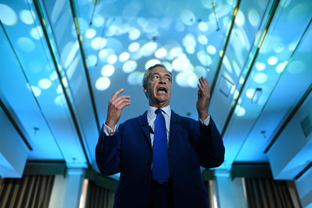 File photo of leader of Reform UK Nigel Farage delivering a speech at a hotel in Blackpool, northwestern England, on June 20, 2024, in the build-up to the UK general election on July 4. — AFP pic