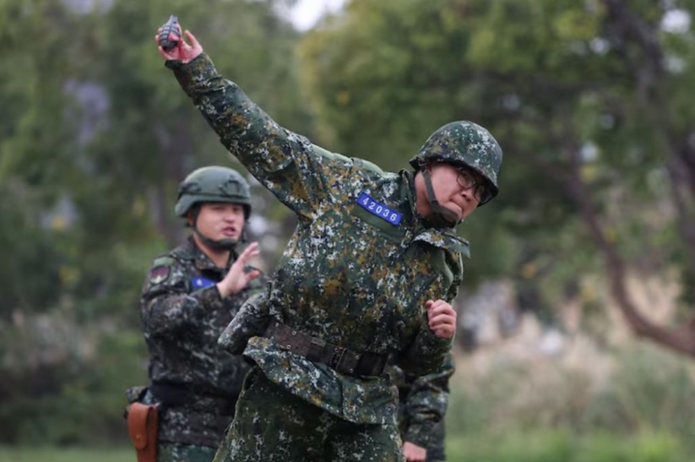 A soldier trains to throw grenade ahead of the Lunar New Year at an army base in Hsinchu, Taiwan, February 6, 2024. — Reuters file pic