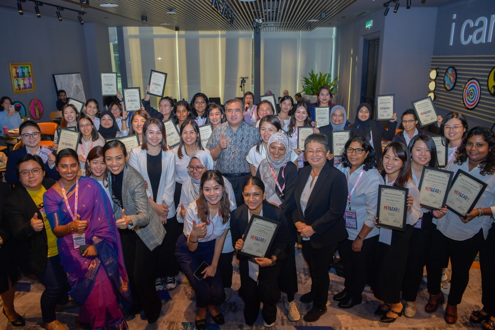 DAP secretary-general Anthony Loke (centre) poses with participants of the HerLead initiative at the closing ceremony of the programme in Putrajaya June 23, 2024. — Bernama pic