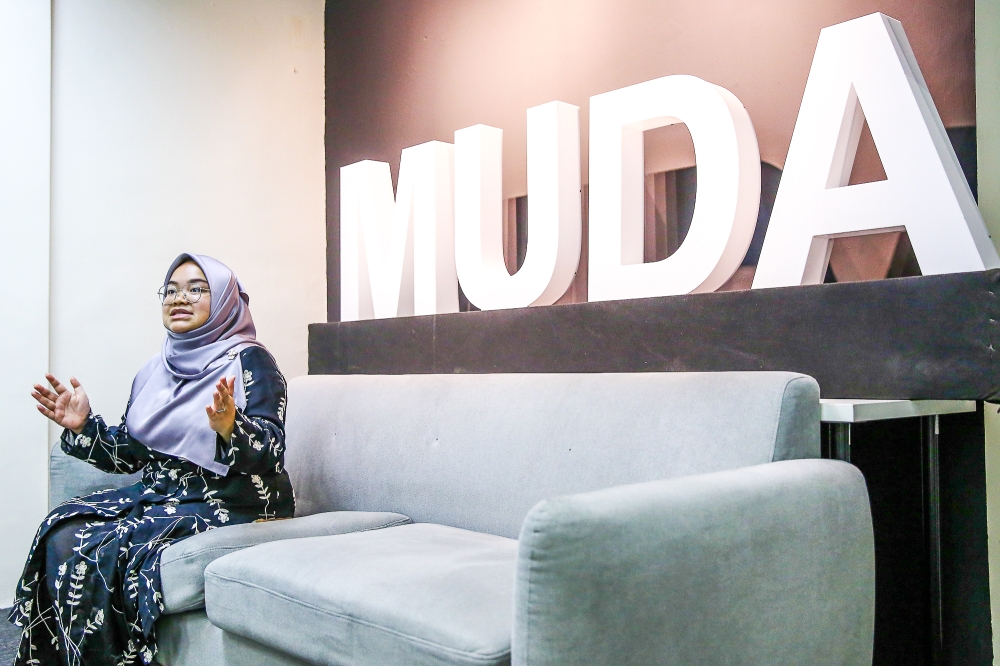 Muda acting president Amira Aisya Abd Aziz speaks to Malay Mail during an interview at its headquarters in Kelana Jaya June 5, 2024. — Picture by Yusof Mat Isa