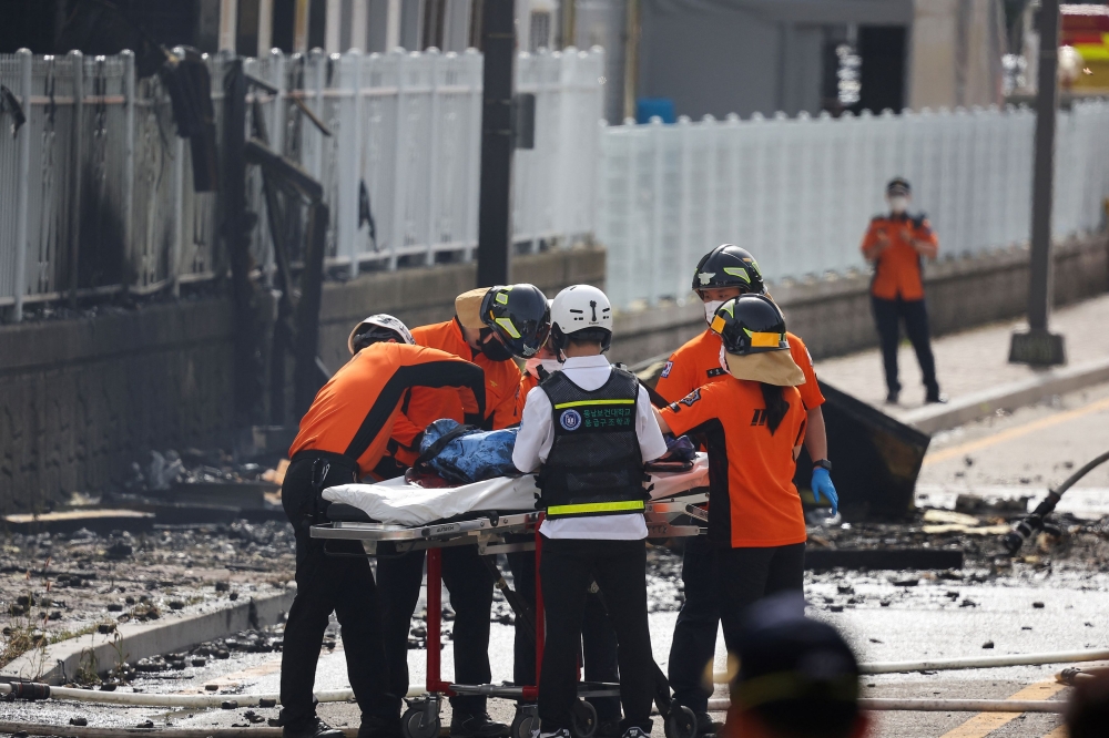 Yonhap news agency reported that some 20 bodies had been found inside the factory. — Reuters pic