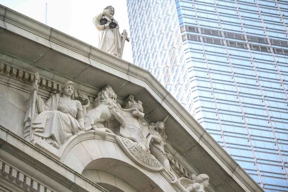 A senior British judge today heard a protest-related case in Hong Kong involving seven high profile democrats, adding to the debate over whether foreign judges should continue to sit on the city’s highest court amid a national security crackdown. — AFP pic