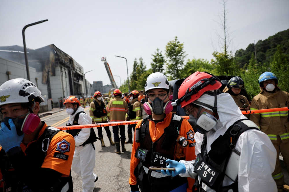 Emergency personnel work at the site of a deadly fire at a lithium battery factory owned by South Korean battery maker Aricell, in Hwaseong, South Korea, June 24, 2024. — Reuters pic