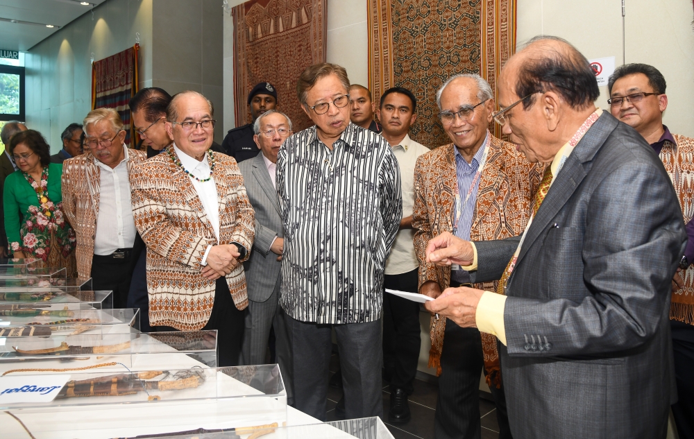 Premier Tan Sri Abang Johari Openg (3rd right) being briefed by Datuk Temenggong Bernard Aggan (right) on the cultural heritage of the Iban community, June 24, 2024. — Picture by Sarawak Public Communications Unit (Ukas)