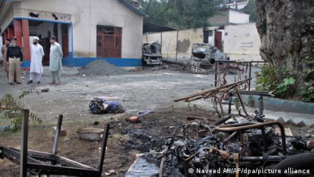 Police in northwestern Pakistan said they were still looking for more potential suspects. A mob attacked a police station to wrest the victim from criminal interrogation, killing him in public and burning his body. — DW pic