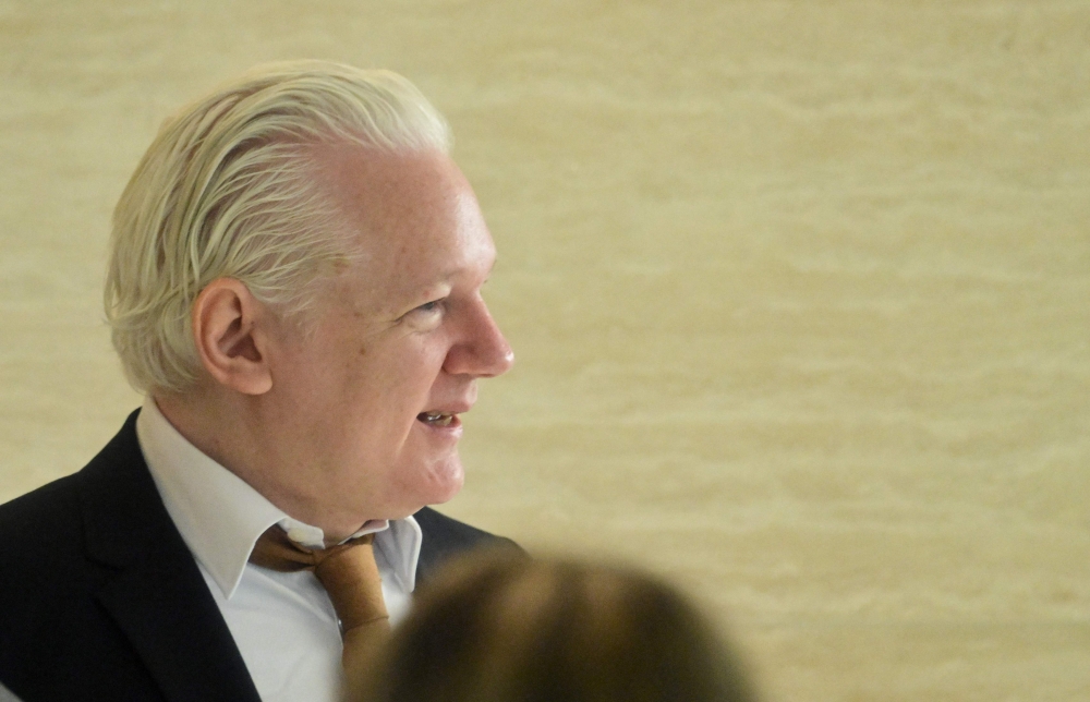 WikiLeaks founder Julian Assange arrived at a US court today to face a final court hearing under a plea deal expected to end years of legal drama and allow him to return to his native Australia as a free man. — AFP pic