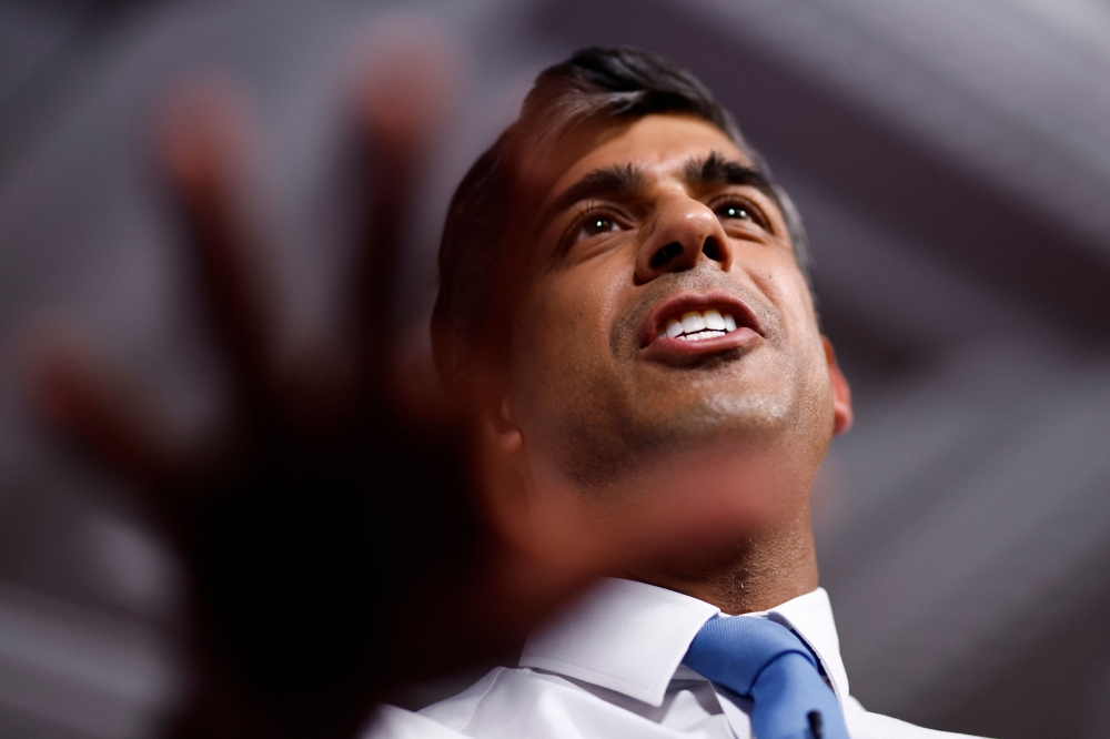 Five more police officers allegedly placed bets on the timing of the UK general election, a force spokesperson said yesterday, as Prime Minister Rishi Sunak withdrew support from two Conservative candidates over the escalating scandal. — AFP pic