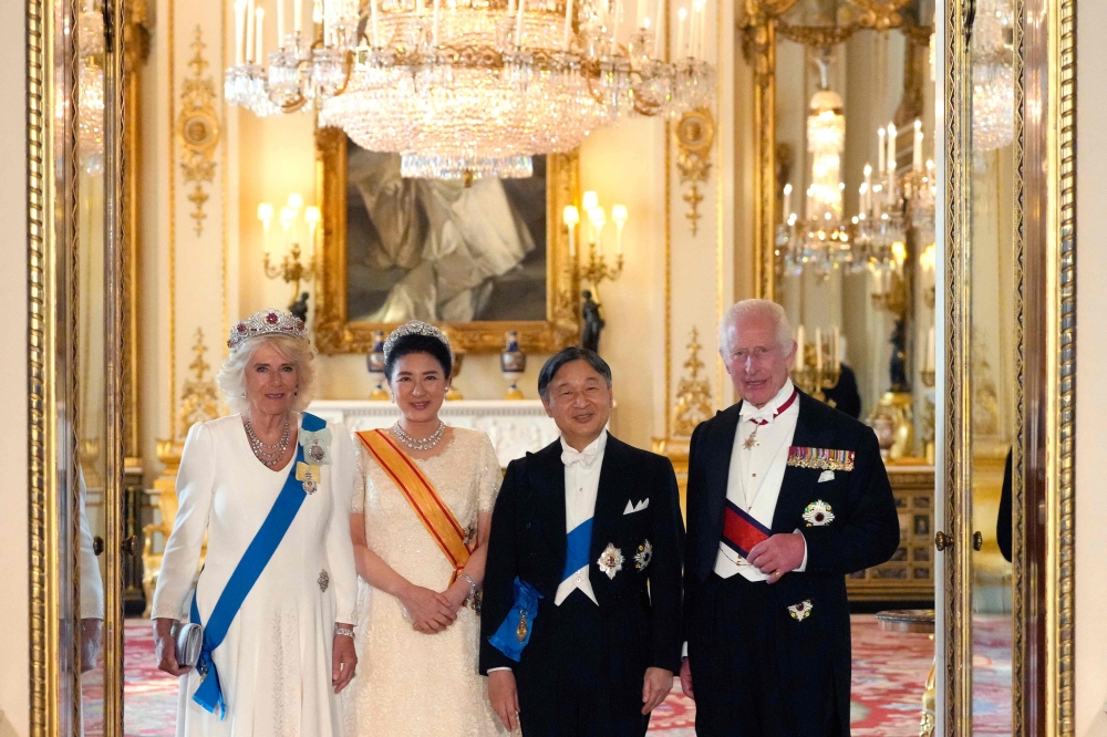King Charles III hailed Britain and Japan’s close friendship at a lavish state banquet for Emperor Naruhito and Empress Masako at Buckingham Palace yesterday as the Japanese royals began a three-day state visit. — AFP pic