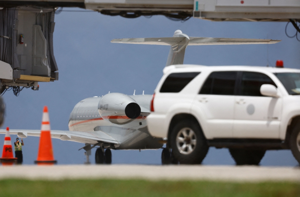 A private jet believed to be transporting WikiLeaks founder Julian Assange prepares to take off at the airport following a hearing at a United States District Court in Saipan. — Reuters pic