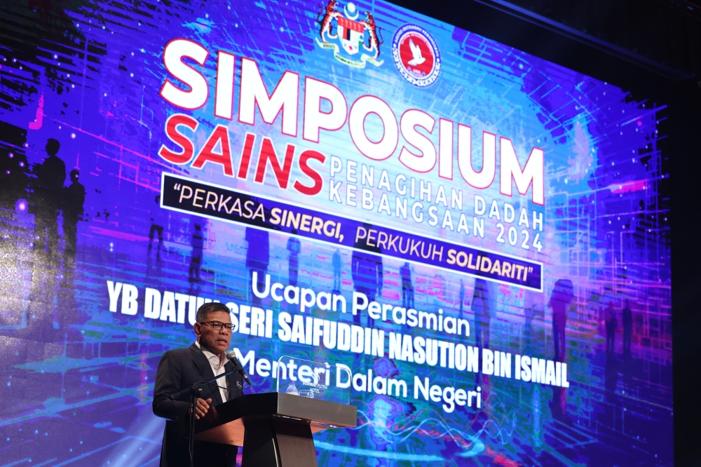 Datuk Seri Saifuddin Nasution Ismail speaks at the National Drug Addiction Science Symposium in Kuala Lumpur, June 26, 2024. The Home Ministry is set to propose amendments to 29 sections of the Drug Dependants (Treatment and Rehabilitation) Act 1983, introducing new measures aimed at tackling drug abuse more effectively in Malaysia. — Bernama pic 