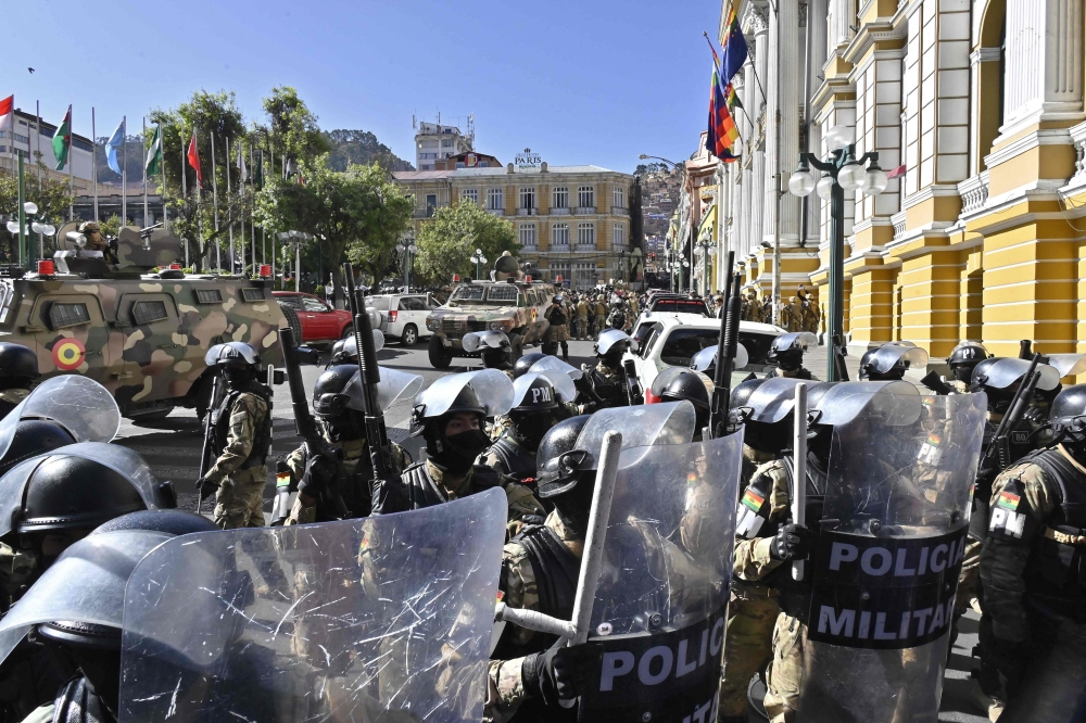 Bolivian President Luis Arce yesterday slammed an attempted coup d’etat after soldiers and tanks deployed outside government buildings and tried to knock down a door of the presidential palace. — AFP pic