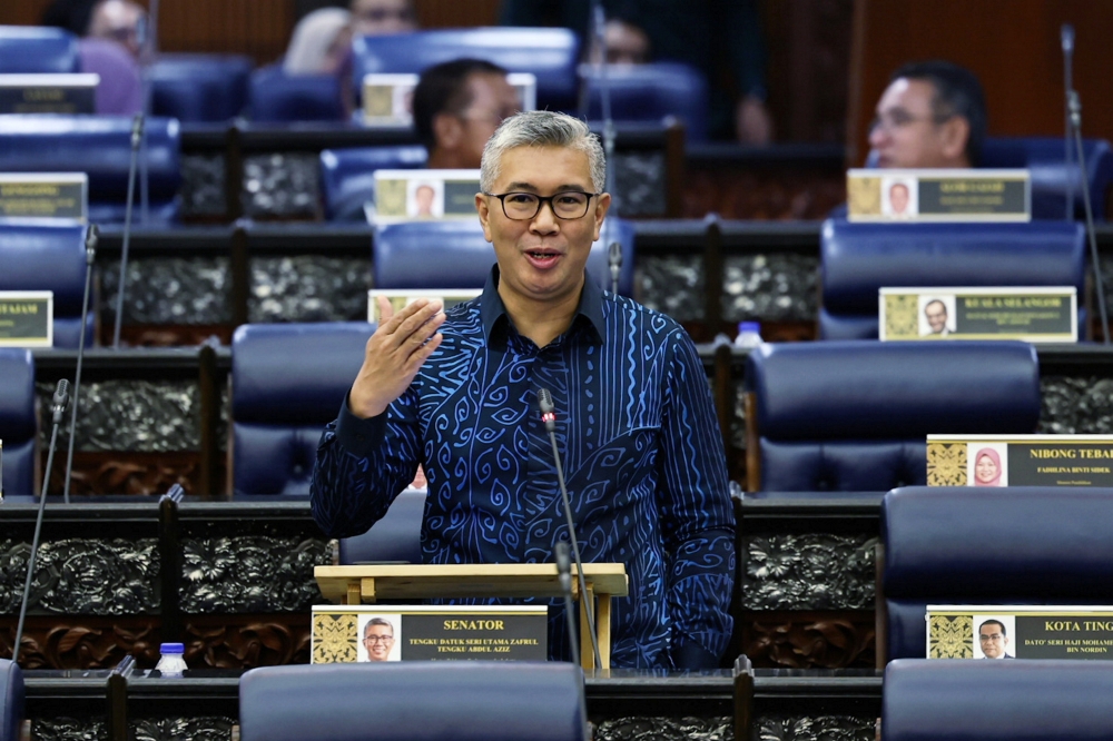 Minister of Investment, Trade and Industry Datuk Seri Tengku Zafrul Aziz speaks during Minister’s Question Time at Parliament June 27, 2024. — Bernama pic