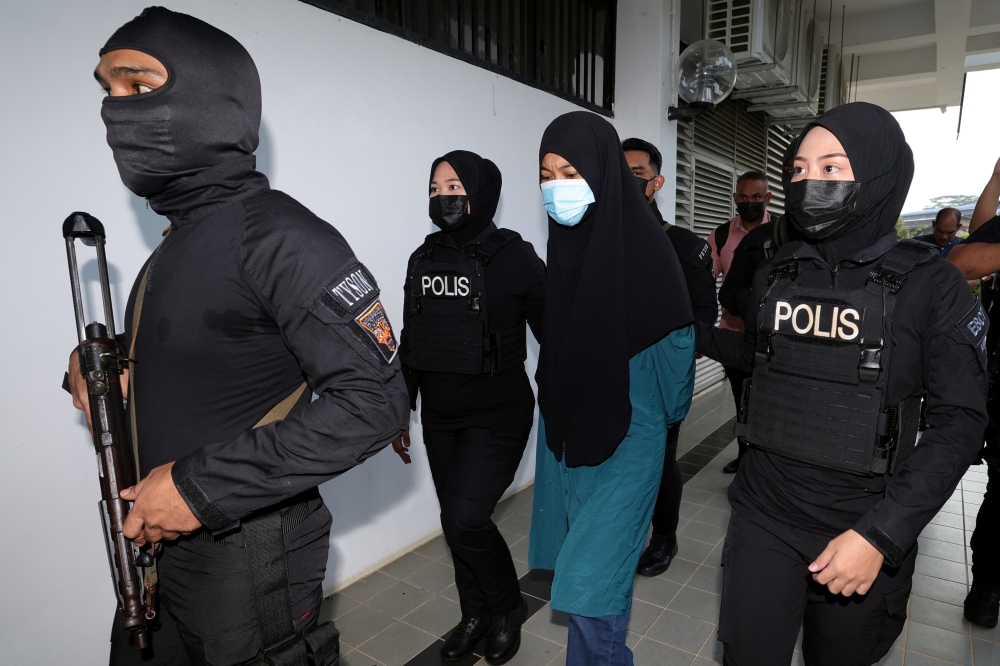 Suhaini Sarwan, 46, is charged with two counts of possessing materials related to the so-called Islamic State (IS) terrorist group. ― Bernama pic