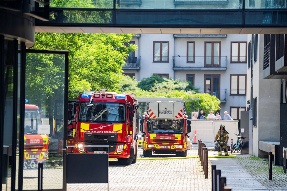 Fire trucks are stationed following a fire in the roof of the Ministry of Taxation in Copenhagen, Denmark, June 27, 2024.  — Ritzau Scanpix via Reuters