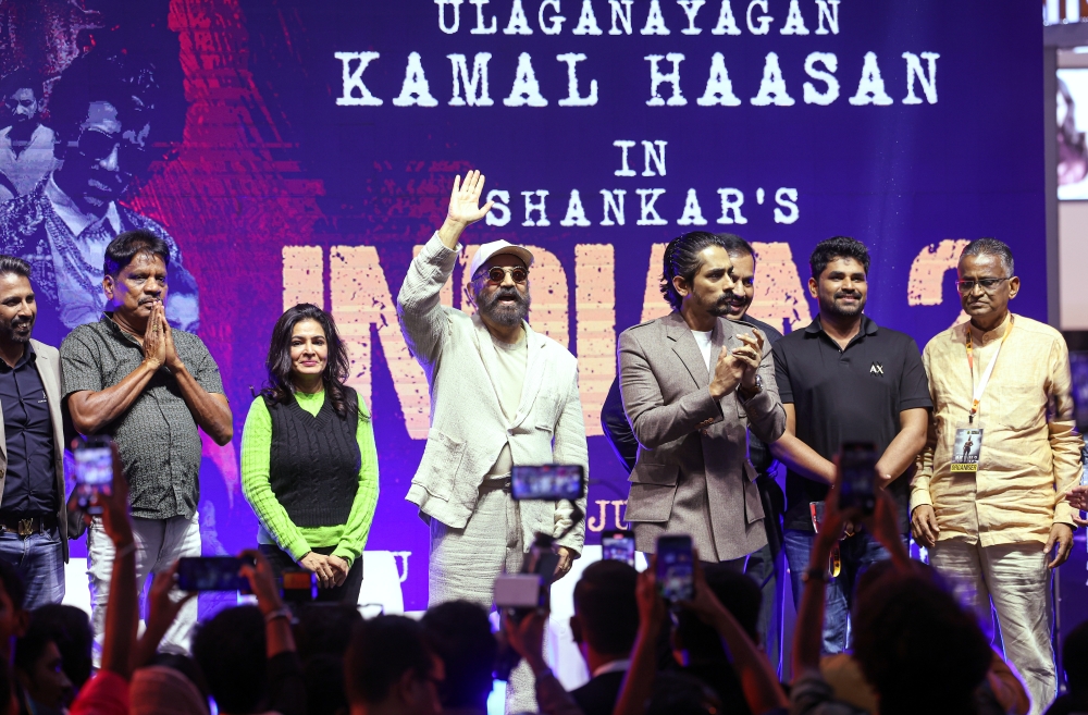 Indian actor Kamal Haasan (4th, left) waves to the fans during the promotion of  ‘Indian 2’ at NU Sentral, June 28, 2024. Also present is actor Siddharth (3rd right). — Bernama pic  