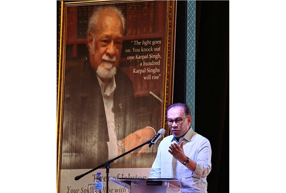 Prime Minister Datuk Seri Anwar Ibrahim delivers a speech at the ‘Reminiscing Karpal’ event in George Town June 29, 2024. — Bernama pic