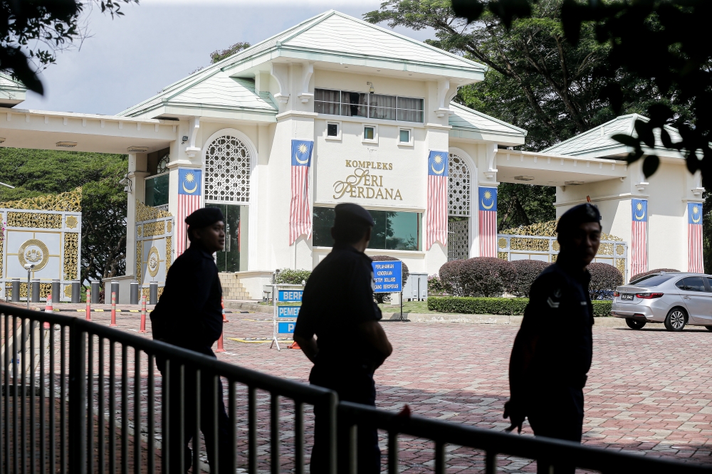 Police officers are seen on standby following the Rakyat Tolak Anwar demonstration at the Seri Perdana Complex in Putrajaya June 29, 2024. — Picture by Sayuti Zainudin 