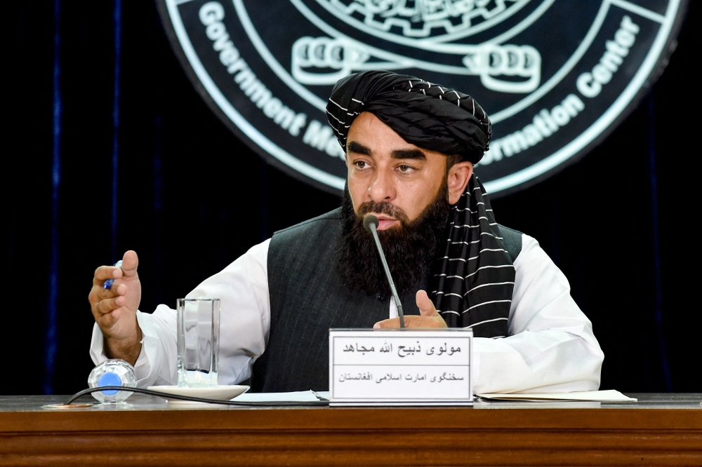 A Taliban spokesman addresses a press conference in Kabul on June 29, 2024. — AFP pic