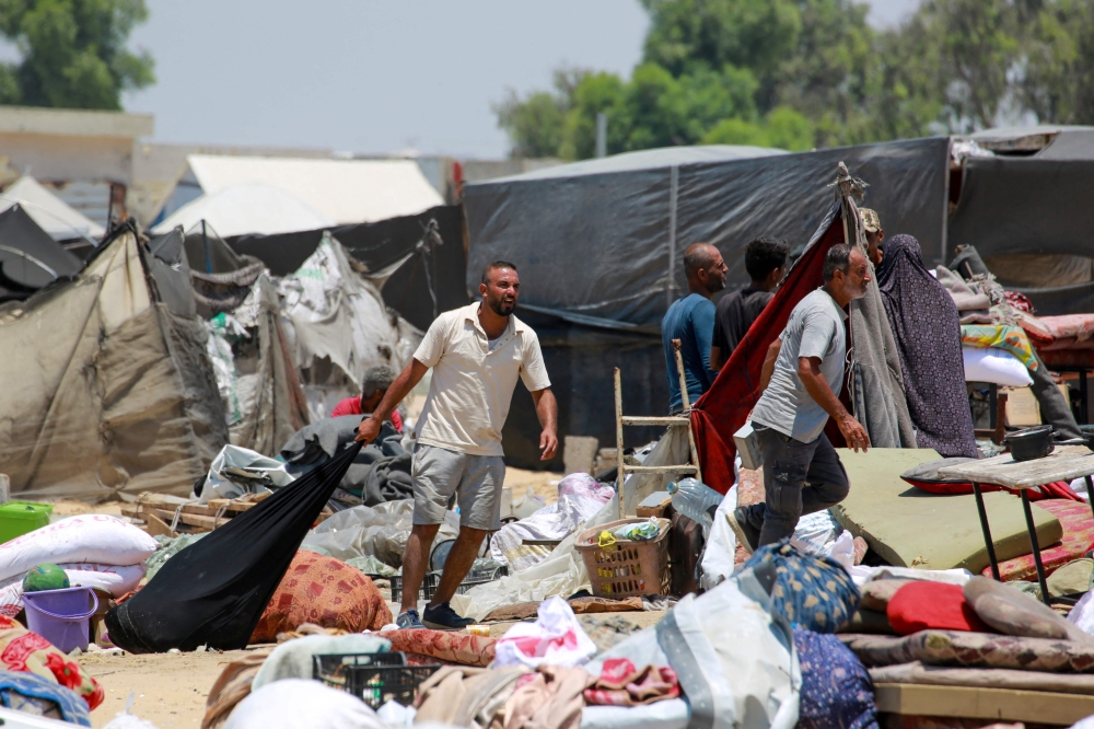 Displaced Palestinians evacuate the Mawassi area in southwest Khan Younis in the southern Gaza Strip on June 28, 2024, amid the ongoing conflict between Israel and the militant Hamas group. — AFP pic