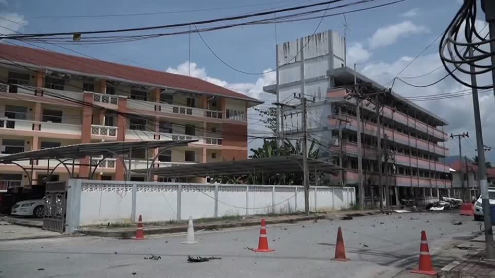 A video screencap of the site of the explosion in front of an apartment belonging to the Bannang Sata police station in the city of Yala. — Screencap via Reuters