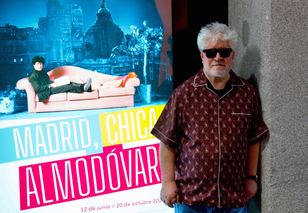 In this handout image made available by Centro Condeduque Spanish filmmaker Pedro Almodovar poses during the opening of the exhibition ‘Madrid, Chica Almodovar’ (Madrid, Almodovar Girl) at the Centro Condeduque in Madrid June 6, 2024. — AFP pic