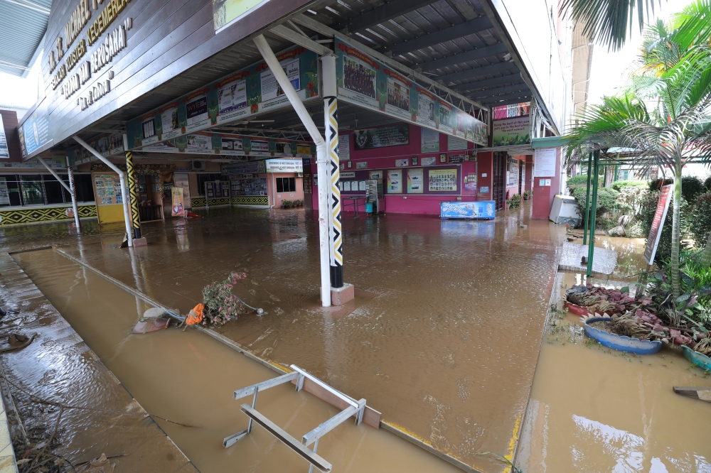 SM St Michael Penampang is temporarily closed for clean-up following flooding due to heavy rains. — Bernama pic