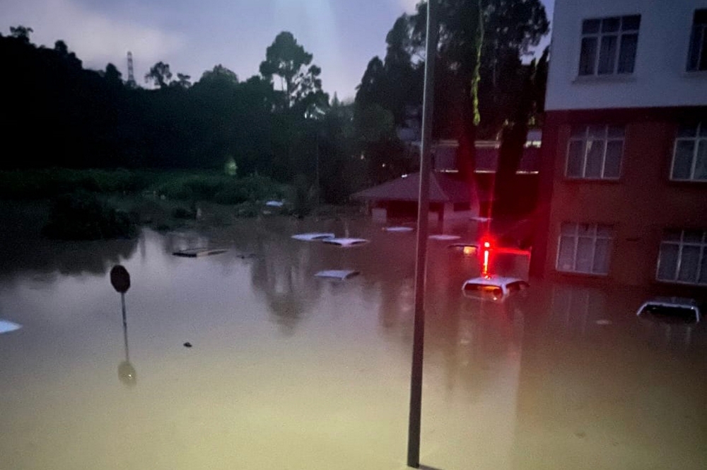 Homes are submerged by flash floods in Taman Vista Seri Kiranau, Penampang, on June 30, 2024, following heavy rain in the district. — Bernama pic