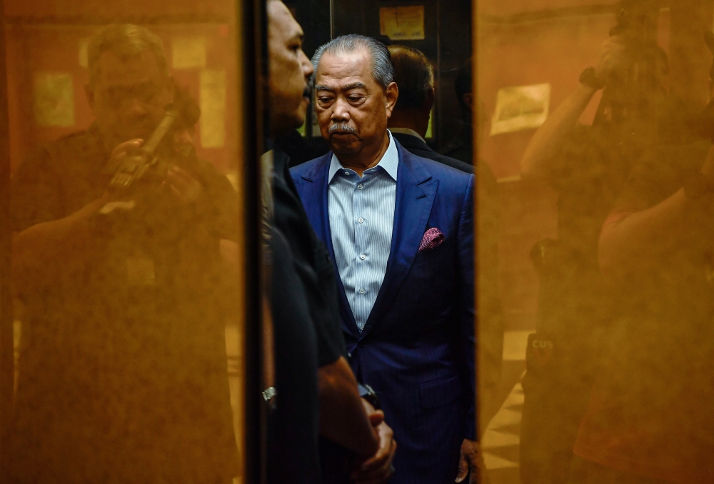 Tan Sri Muhyiddin Yassin at the Kuala Lumpur Court Complex, July 3, 2024. The Sessions Court today granted Muhyiddin’s application for the temporary release of his international passport to allow him to attend his granddaughter’s graduation ceremony in London. — Bernama pic