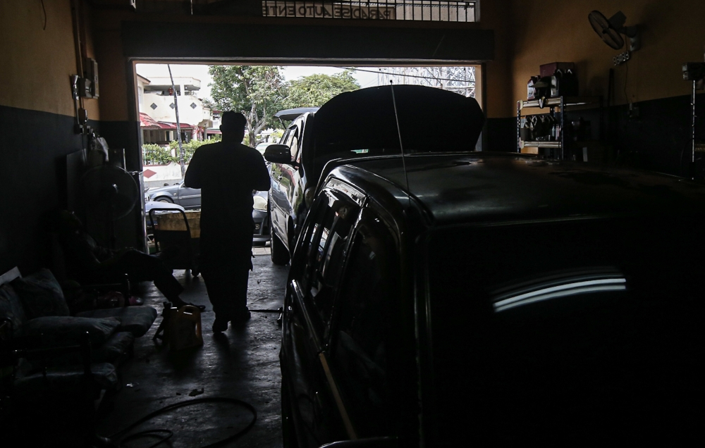 A file photo shows a general view of a workshop in Ipoh. Malaysia is proposing a so-called ‘lemon law’ that would provide vehicle buyers in the country more protection against faulty purchase, up to and including a full refund for cars falling below an acceptable standard of quality. — Picture by Farhan Najib