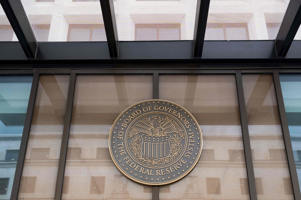 Members of the US Federal Reserve’s rate-setting committee said last month that the bank’s employment and inflation goals were moving into better balance. — AFP pic