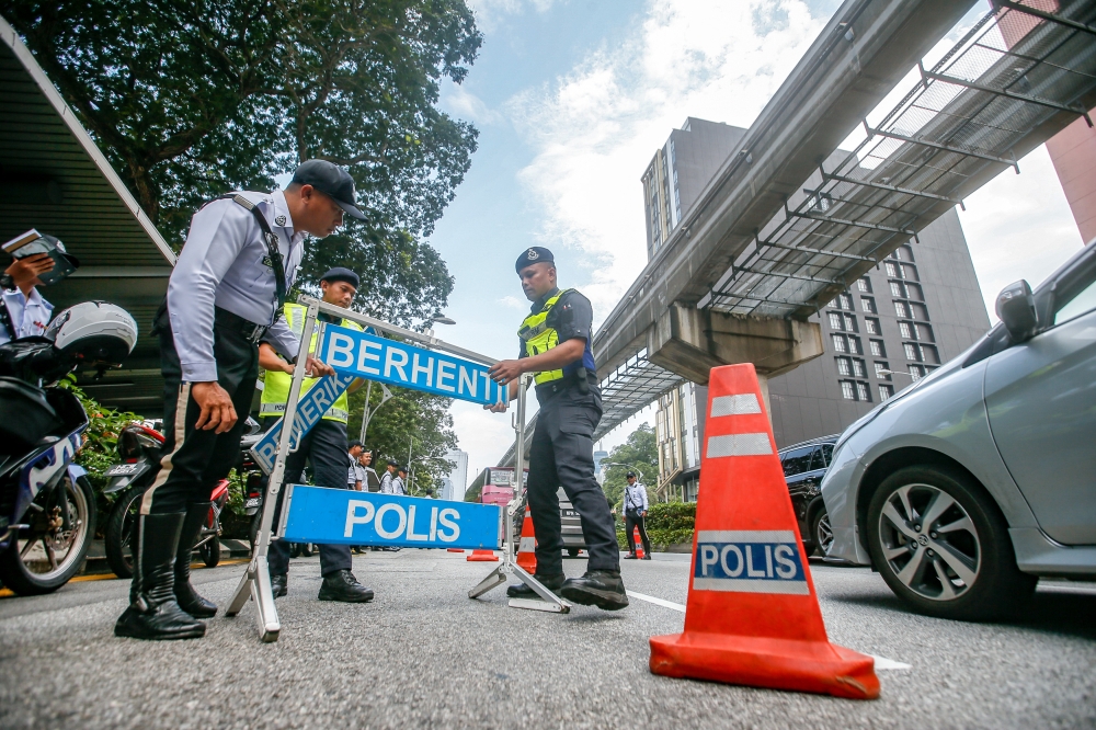 According to Ipsos data, 65 per cent of respondents expressed confidence in law enforcement’s ability to apprehend the correct criminals after a crime. — Picture by Hari Anggara