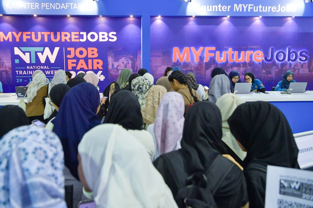 Job seekers checking out the MyFuture Jobs exhibition at the National Bukit Jalil Stadium in June 2024 — Bernama file pic