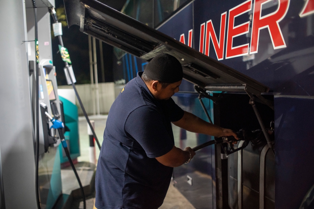 A person is seen refuelling a a diesel vehicle in Kajang in this June 9, 2024 file photograph. — Picture by Shafwan Zaidon