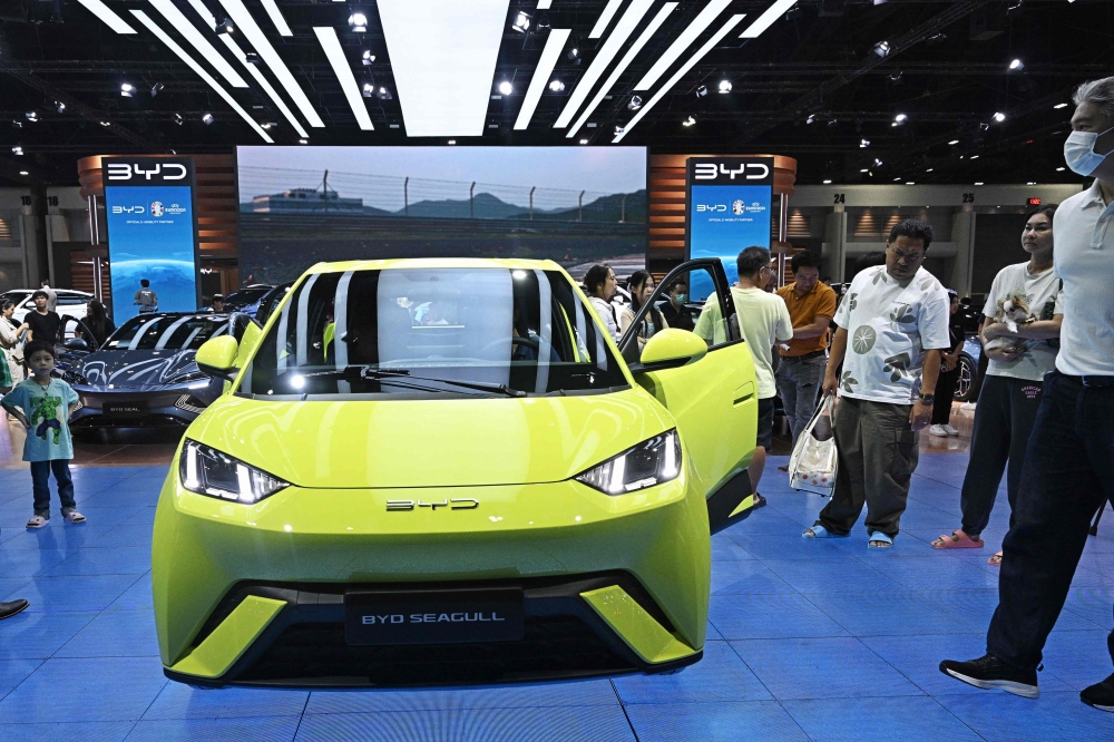 Chinese sales of EVs abroad rose 70 per cent in 2023, reaching US$34.1 billion. — AFP pic
