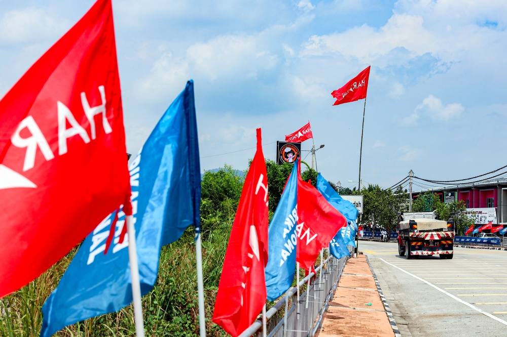 Party flags are seen along the road ahead of the Sungai Bakap by-election. The think-tank linked to the Selangor government suggested that voters in the Penang state constituency could still lean either way, with a small shift in support enough to decide the outcome of the poll. — Bernama pic