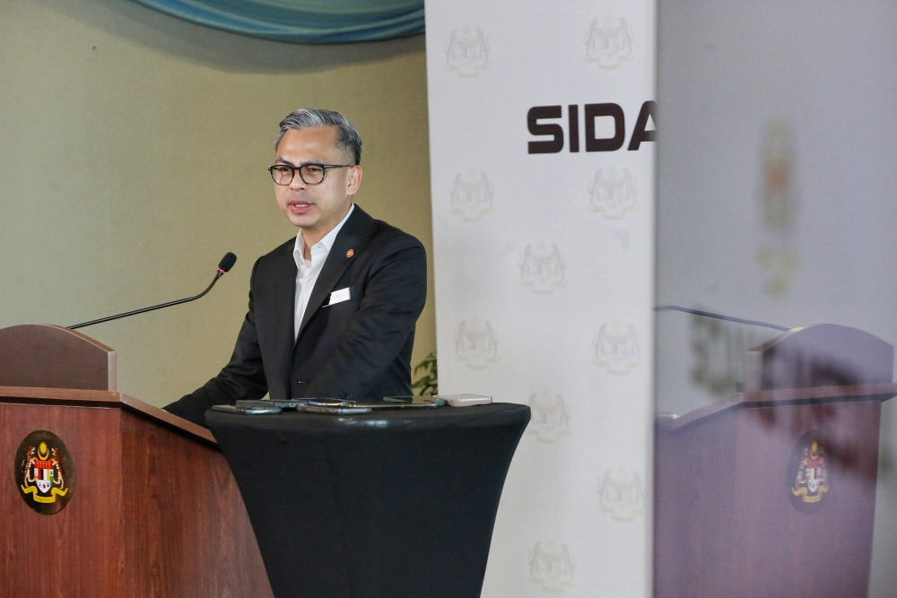 Communications Minister Fahmi Fadzil said the Anwar government wants accountability, will not interfere with MACC investigations after national audit reports show irregularities within HRD Corp. — Picture by Choo Choy May .