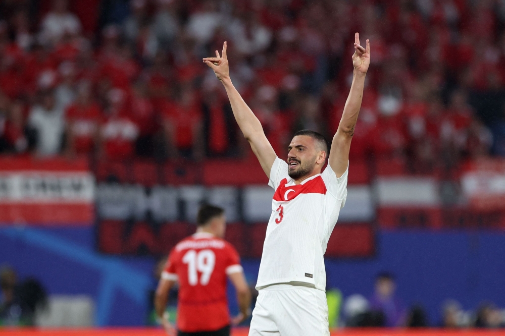 Turkiye’s defender #03 Merih Demiral makes a controversial hand gesture as he celebrates scoring his team’s second goal during the Uefa Euro 2024 round of 16 football match between Austria and Turkiye at the Leipzig Stadium in Leipzig July 2, 2024. — AFP pic