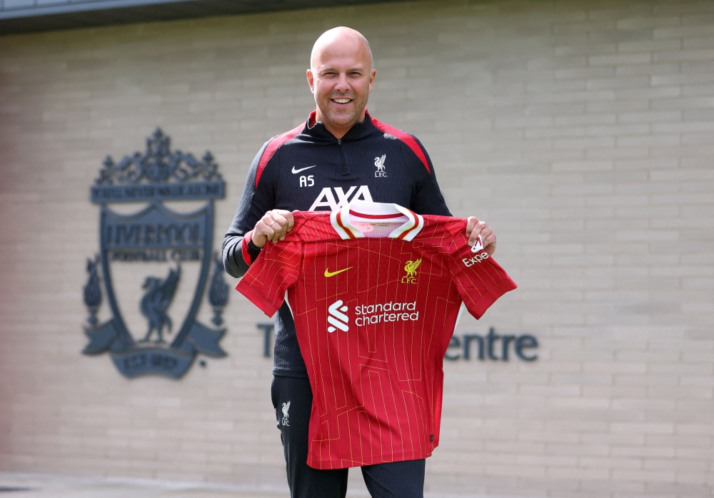 Slot’s commitment to an attacking, high-tempo style similar to Klopp’s game-plan was significant in the decision to hire him. — Reuters pic