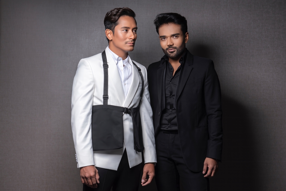 Fashion designers Rizman Nordin (right) and Ruzaini Jamil launched Rizman Ruzaini in 2005 after completing their fashion studies at UiTM Sri Iskandar Perak. — Picture courtesy of Rizman Ruzaini