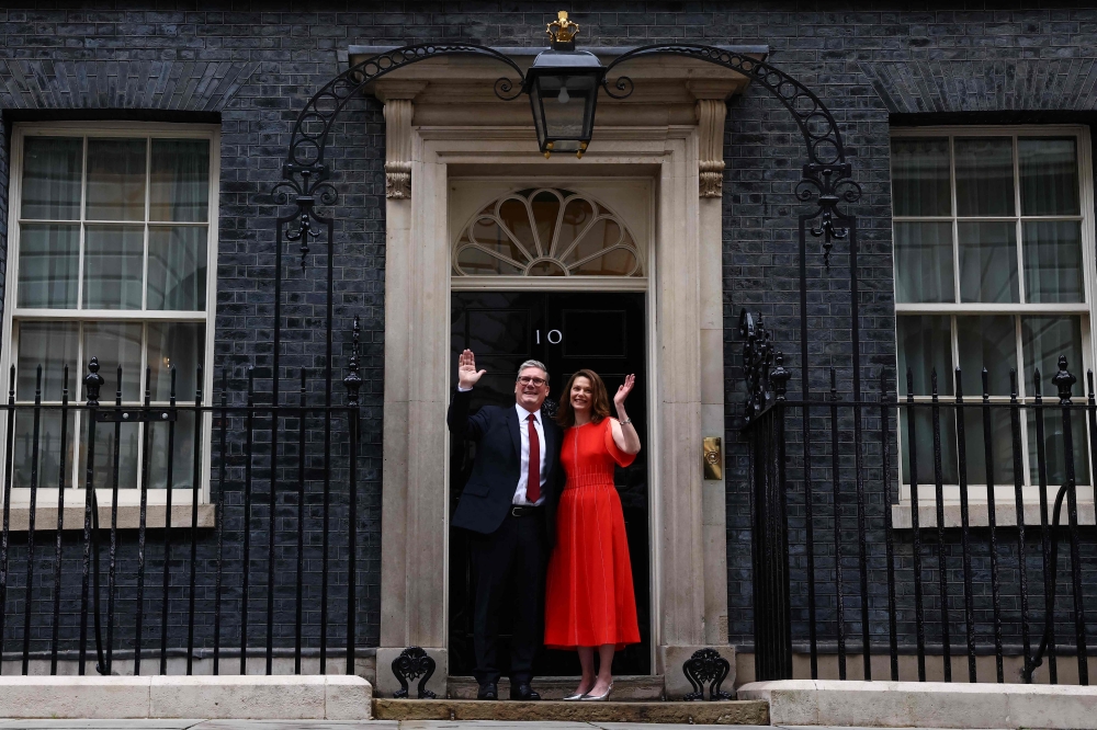 Prime Minister Keir Starmer and his wife Victoria at 10 Downing Street. — AFP 