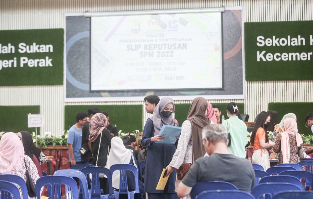 File picture of SMK Gunung Rapat students collecting their SPM results at the school hall in Ipoh June 8, 2023. — Picture by Farhan Najib