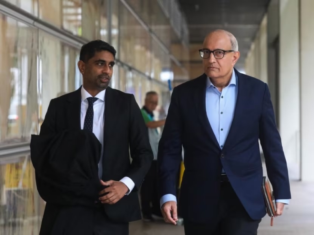 S Iswaran (right) and lawyer Navin Thevar (left) arriving at the Supreme Court on July 5, 2024. — TODAY pic