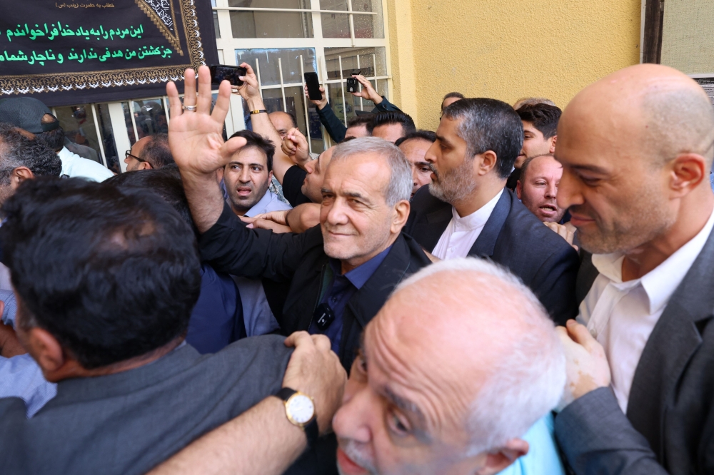 Iran’s reformist candidate Masoud Pezeshkian today won a runoff presidential election against ultraconservative Saeed Jalili, state media reported. — AFP pic